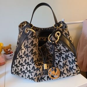 Michael Kors Purse. Monogram. Leather. Gol…